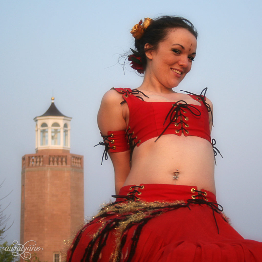 Belly dancer with light house